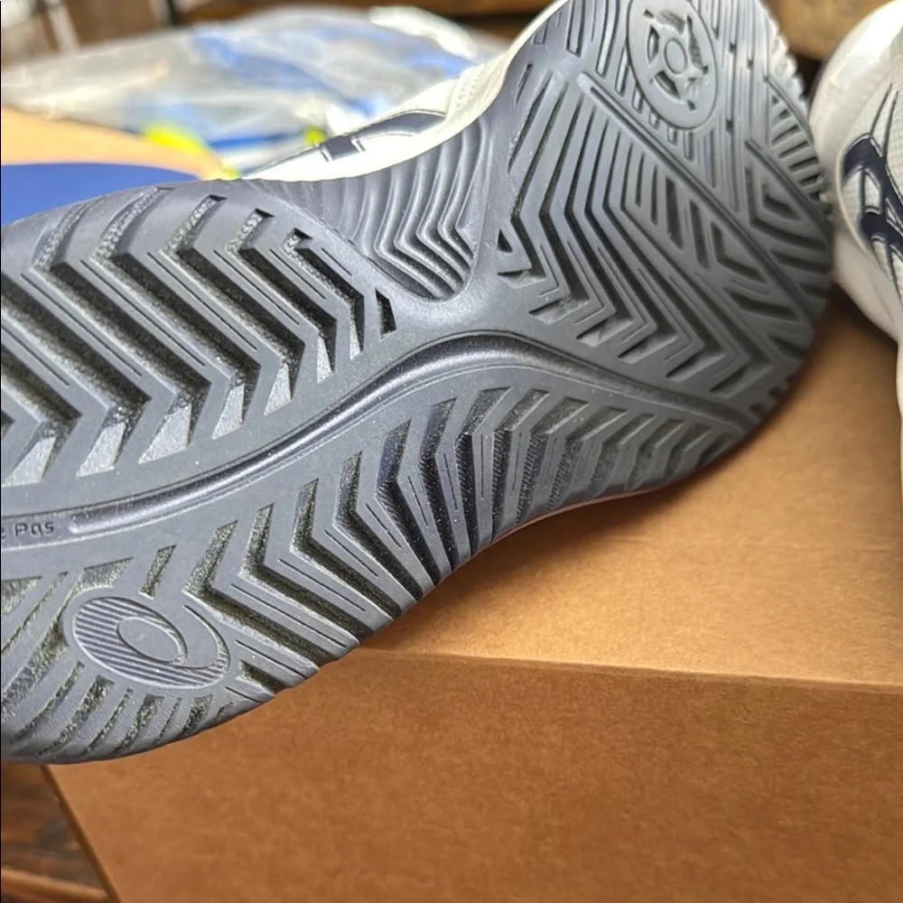 Asics White and Blue Athletic Shoes with Performance Focus